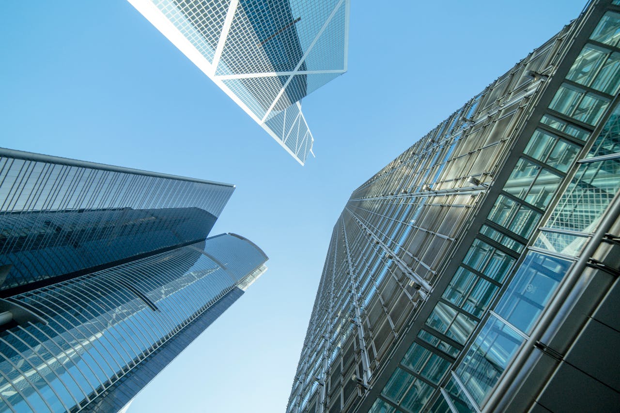 Modern skyscrapers captured from below, showcasing Hong Kong